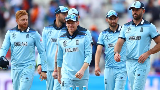 BIRMINGHAM, ENGLAND — JUNE 30: Eoin Morgan (c) alongside Jonny Bairstow (l) and Liam Plunkett (r) following his side's 31 run victory during the Group Stage match of the ICC Cricket World Cup 2019 between England and India at Edgbaston on June 30, 2019 in Birmingham, England. (Photo by Michael Steele/Getty Images)