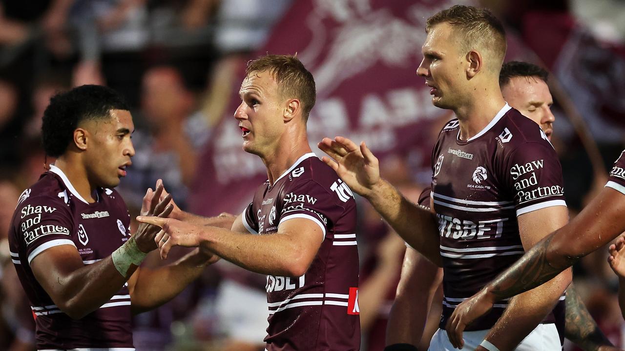 SYDNEY, AUSTRALIA - APRIL 06: DalyÃ&#130;Â Cherry-Evans of the Sea Eagles celebrates with his team mates after scoring a try during the round five NRL match between Manly Sea Eagles and Penrith Panthers at 4 Pines Park, on April 06, 2024, in Sydney, Australia. (Photo by Cameron Spencer/Getty Images)