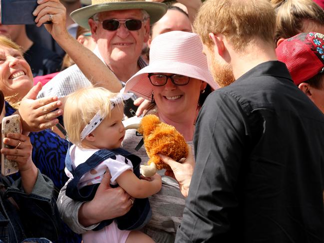 Prince Harry meets a young fan in the Rotorua Government Gardens. Picture:  Nathan Edwards