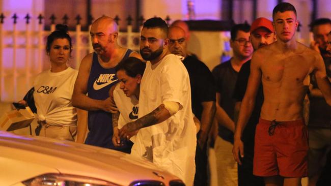 Nabil Maghnie’s son Abbas returned to the scene in his hospital gown. Picture: Wayne Taylor