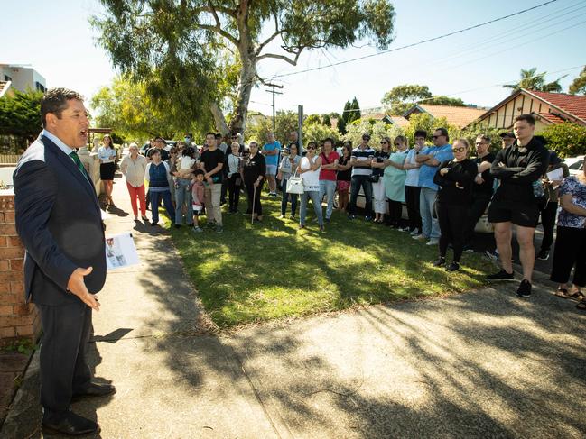 Pictures from the AUCTION OF 193 DONCASTER AVENUE IN KENSINGTON AS AUCTIONEER SCOTT KENNEDY GREEN BRINGS DOWN THE GAVEL ON THE PROPERTY. (PICTURES BY JULIAN ANDREWS).