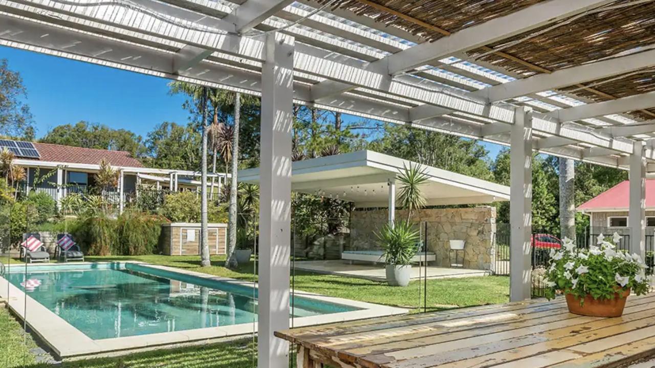 Tin Horse Ranch Byron Hinterland boasts an inviting home overlooking a swanky pool.