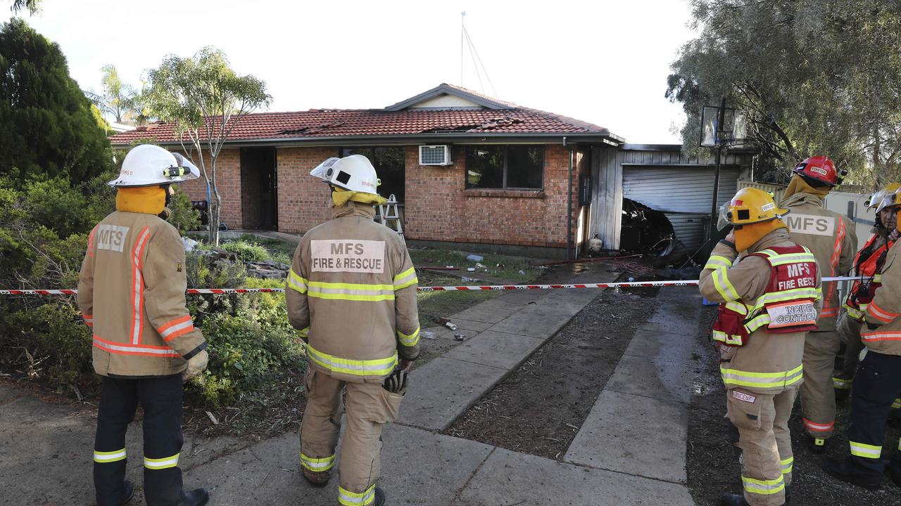 MFS firefighters at the Darlington home, which was destroyed by fire. Picture: AAP / Dean Martin