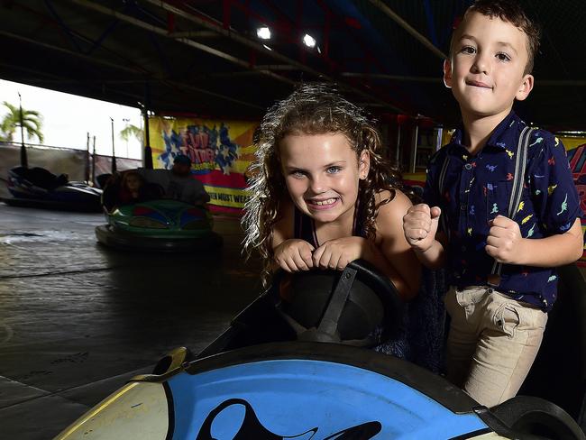 Isabella, 8, and Hamish Heslin, 6 on the new dodge em cars at Townsville Mini Golf, a collaboration with ride operators who have found themselves without business after many shows and carnivals were cancelled. PICTURE: MATT TAYLOR.