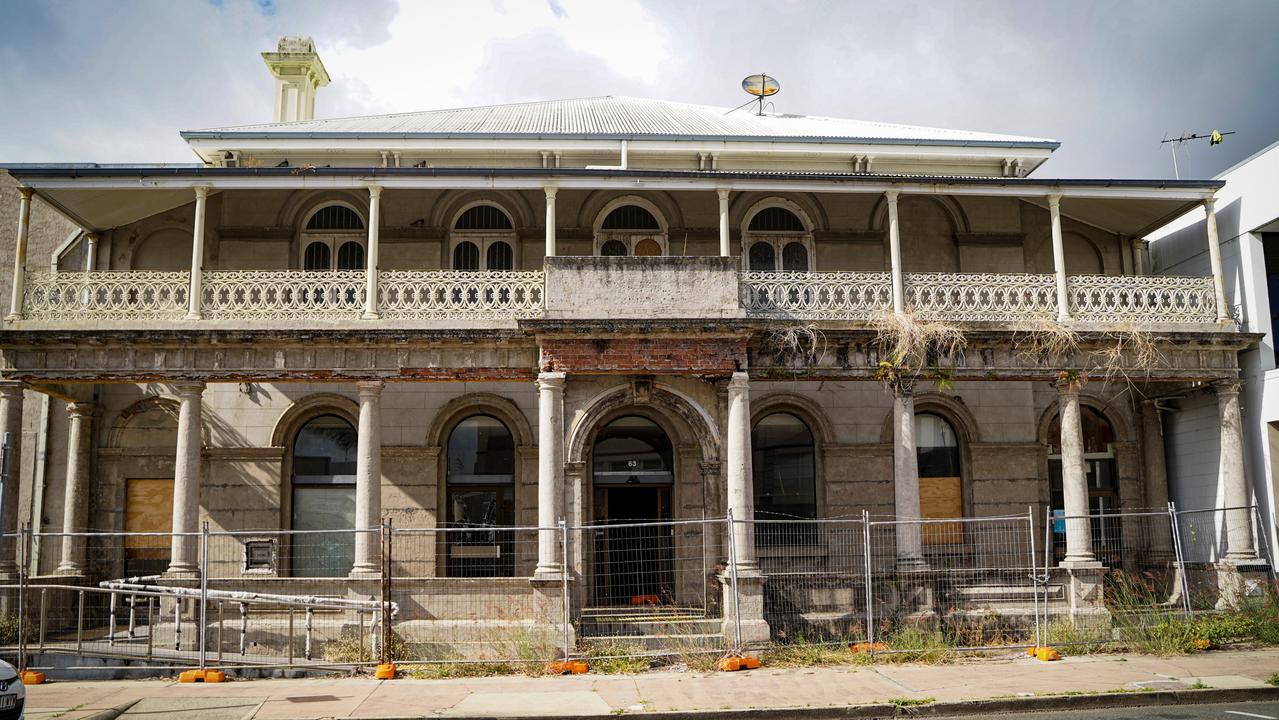 The derelict heritage-listed building at 63 Victoria St in Mackay CBD was recently vandalised with the steel fencing left ajar as well as the front door. Picture: Heidi Petith