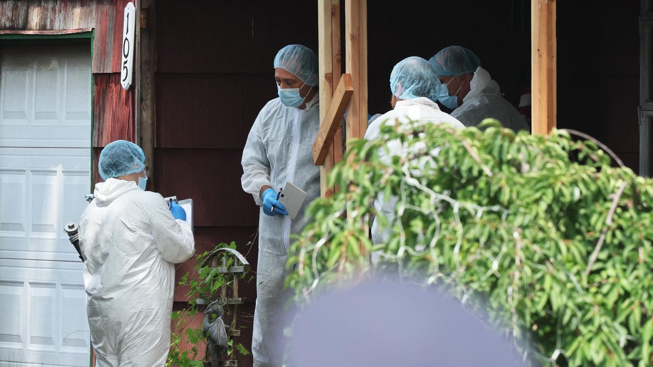 Investigators at Rex Heuermann’s childhood home. Picture: Michael M. Santiago/Getty Images via AFP