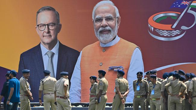 A poster featuring Anthony Albanese and Indian Prime Minister Narendra Modi at the Narendra Modi Stadium in Ahmedabad. Picture: AFP.