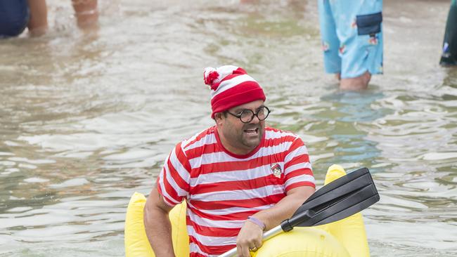 MANLY DAILY/AAP. Participants hit the water at the start of the second wave during the annual Manly Inflatable Boat Race at Shelly Beach at Manly on Sunday, 23 February, 2020. The event is probably the Northern Beaches craziest charity fundraising event. (AAP IMAGE / Troy Snook)