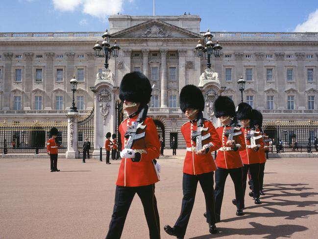 ESCAPE: ROYAL BRITAIN .. Richard Green story .. guards at Buckingham Palace London. Picture: Getty