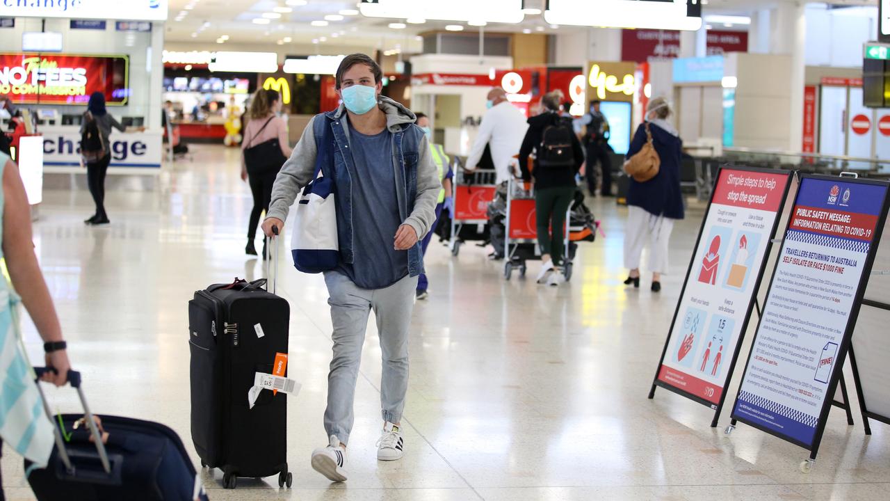 Passengers are met by public health nurses on arrival at Sydney International Airport. Picture: Nikki Short