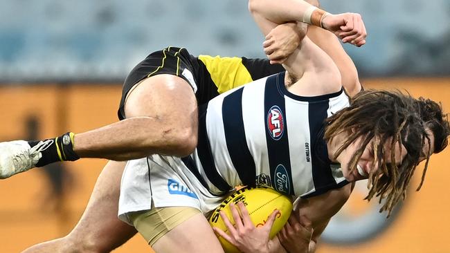 Gryan Miers is tackled when taking on the Tigers at the weekend. Picture: Getty Images