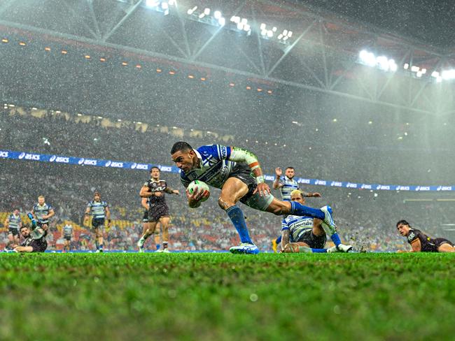 BRISBANE, AUSTRALIA - APRIL 24: Marcelo Montoya of the Bulldogs makes a break and scores a try during the round eight NRL match between Brisbane Broncos and Canterbury Bulldogs at Suncorp Stadium, on April 24, 2025, in Brisbane, Australia. (Photo by Albert Perez/Getty Images)