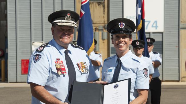 New Fire and Rescue graduate Nadine Hyslop who will be attached to the Lakemba brigade. With FRNSW Commissioner Paul Baxter taken at the graduation ceremony on Friday, April 13, at FRNSW State Training College in Alexandria. Picture: Fire & Rescue NSW