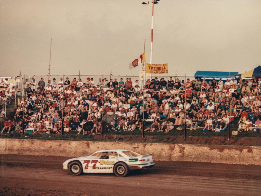 Crowd watching a race at Archerfield Speedway. Photo: State Library of Queensland