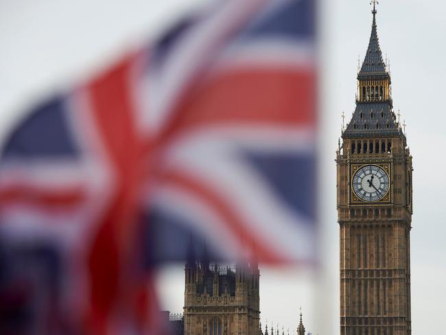 A Union flag flies in the wind in front of the Big Ben clock face and the Elizabeth Tower at the Houses of Parliament in central London on November 3, 2016. The High Court struck a blow Thursday to the British government's plans for leaving the EU, ruling it must seek parliament's approval before starting exit talks. The ruling raises the prospect of a protracted parliamentary debate before then, in a chamber which overwhelmingly opposed Brexit and may seek to soften the break with the EU. / AFP PHOTO / Niklas HALLE'N