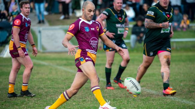 Shellharbour Stingrays Vs Sharks. Emanuel Sultana kicking the ball though the line. Picture: Thomas Lisson