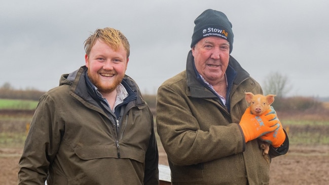 Jeremy Clarkson with Kaleb Cooper and a new addition to the farm. Picture: Ellis O’Brien/Prime Video