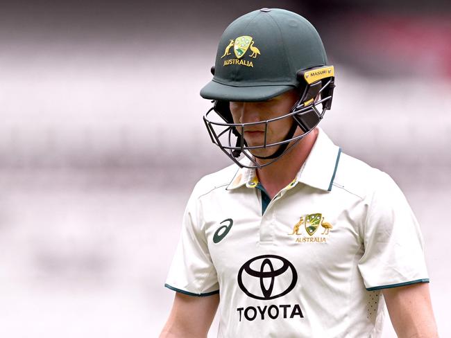 Australian batsman Nathan McSweeney reacts after being dismissed during the third day of the cricket match between Australia A and India A at the Melbourne Cricket Ground (MCG) in Melbourne on November 9, 2024. (Photo by William WEST / AFP) / --IMAGE RESTRICTED TO EDITORIAL USE - STRICTLY NO COMMERCIAL USE--