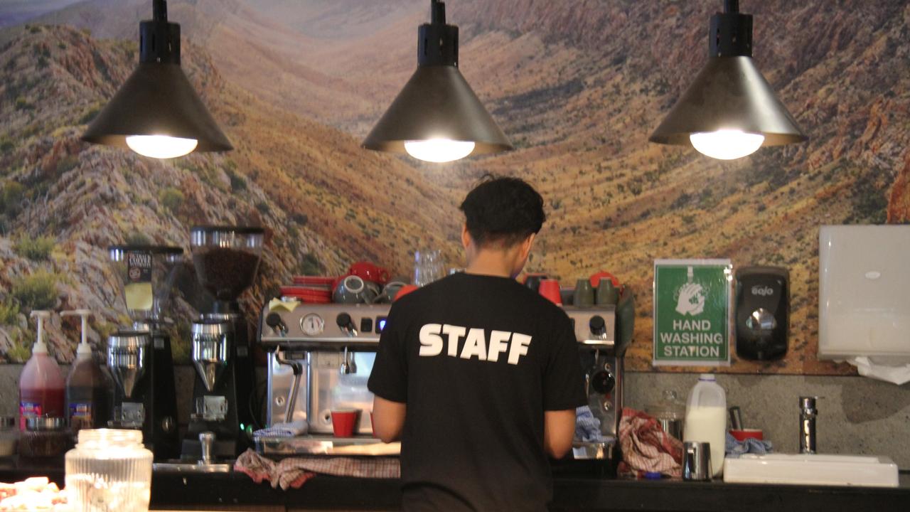 An Alice Springs Brewing Co employee at the namesake pub in Alice Springs. Picture: Gera Kazakov