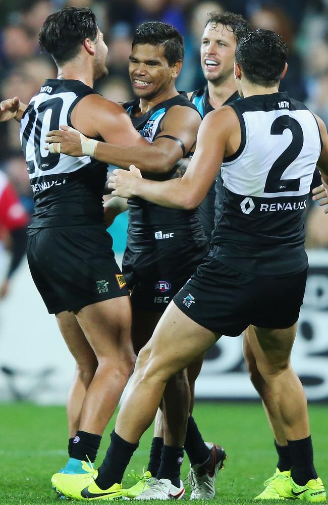 Jake Neade of the Power celebrates a goal during Port Adelaide’s 40-point win against Brisbane.