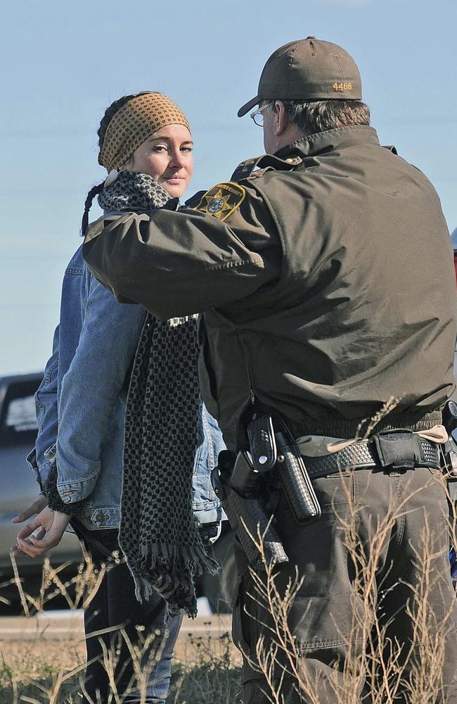 Woodley being arrested for trespassing while protesting the Dakota Access Pipeline.