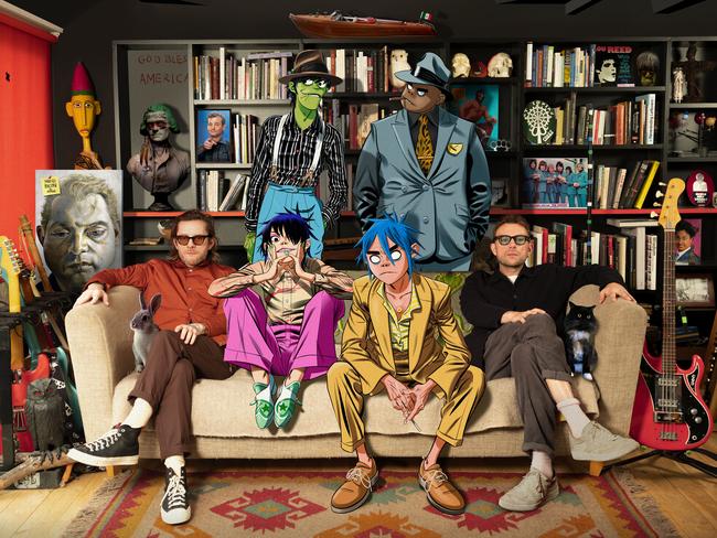 English virtual band Gorillaz creators Jamie Hewlett (left) and Damon Albarn (right) with animated band members Murdoc Niccals, Russel Hobbs, Noodle and 2-D.