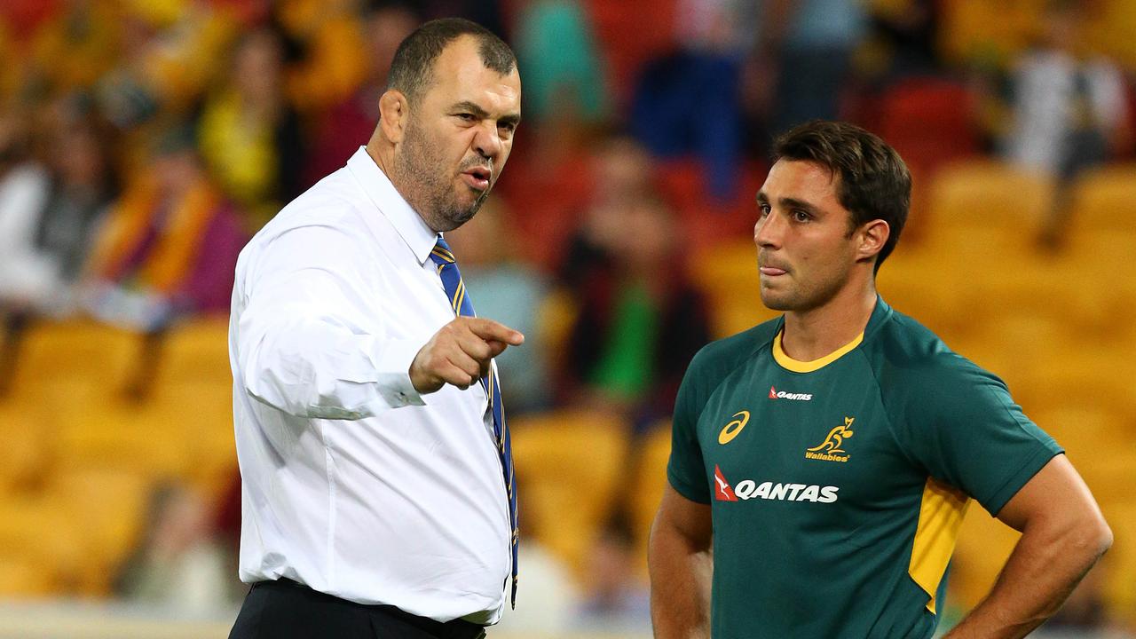 Wallabies coach Michael Cheika talks to Nick Phipps at Suncorp Stadium.