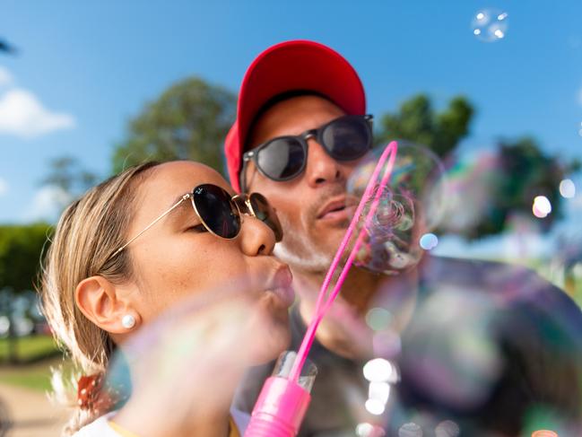 Chantelle and Billy Kathopoulis release bubbles at the Walk to Remember. Picture: Che Chorley