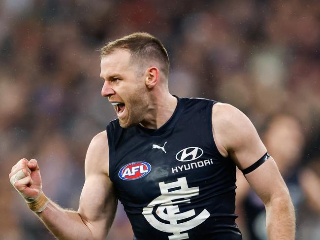 MELBOURNE, AUSTRALIA - AUGUST 12: Sam Docherty of the Blues celebrates a goal during the 2023 AFL Round 22 match between the Carlton Blues and the Melbourne Demons at Melbourne Cricket Ground on August 12, 2023 in Melbourne, Australia. (Photo by Dylan Burns/AFL Photos via Getty Images)