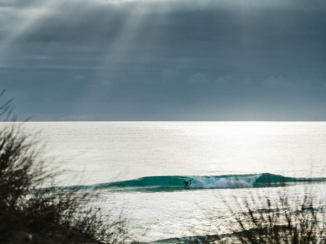 The crystal-clear, turquoise waters of Martha Lavinia Beach, on King Island, is a popular spot for surfers. Picture: STU GIBSON/TOURISM TASMANIA