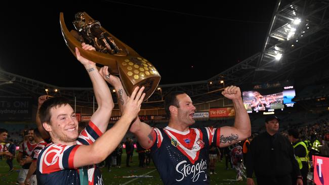 Luke Keary and Boyd Cordner celebrate with the trophy after the Roosters’ grand final triumph. Picture: AAP