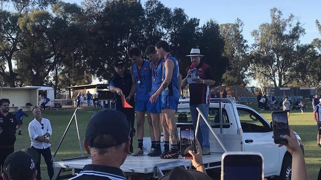 Barmera Monash players accept their medals. Picture: Barmera Monash Football Club