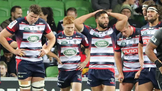 MELBOURNE, AUSTRALIA - MAY 27:  Captain Nic Stirzaker and the Rebels look dejected after the Crusaders scored a try during the round 14 Super Rugby match between the Rebels and the Crusaders at AAMI Park on May 27, 2017 in Melbourne, Australia.  (Photo by Scott Barbour/Getty Images)