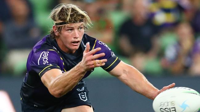 MELBOURNE, AUSTRALIA - MARCH 17: Harry Grant of the Storm passes during the round two NRL match between the Melbourne Storm and the South Sydney Rabbitohs at AAMI Park, on March 17, 2022, in Melbourne, Australia. (Photo by Kelly Defina/Getty Images)