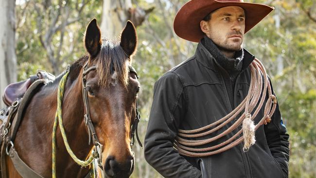 Bairnsdale horseman Lewis Benedetti with his horse Assassin, in bushland outside of Cobberas. Picture: Zoe Phillips