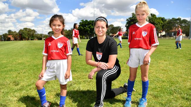 Pagewood Botany Football Club members Erin Jones, Coach Julia Chernoukha and Annabelle Pollett at Jellicoe Park in Pagewood .Picture: Joel Carrett