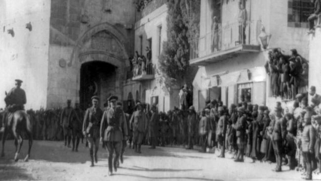 General Edmund Allenby enters Jerusalem on foot on December 11, 1917, two days after it surrendered to British forces.