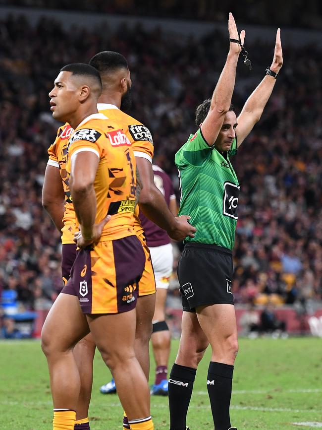 Referee Gerard Sutton makes another sin bin during the Broncos game. Picture: Bradley Kanaris/Getty Images