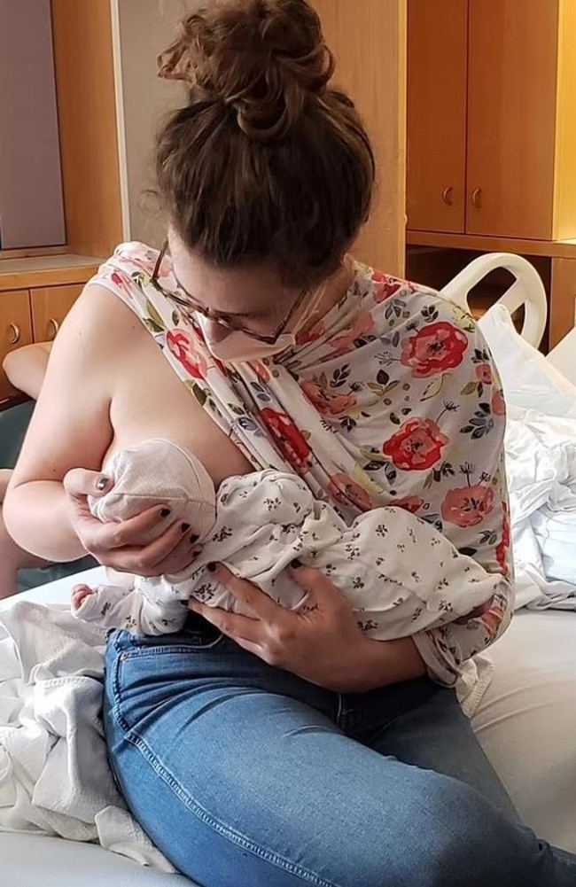 A transgender woman who shared her joy at being able to breastfeed her daughter has caused outrage over her snap. Picture: Reddit