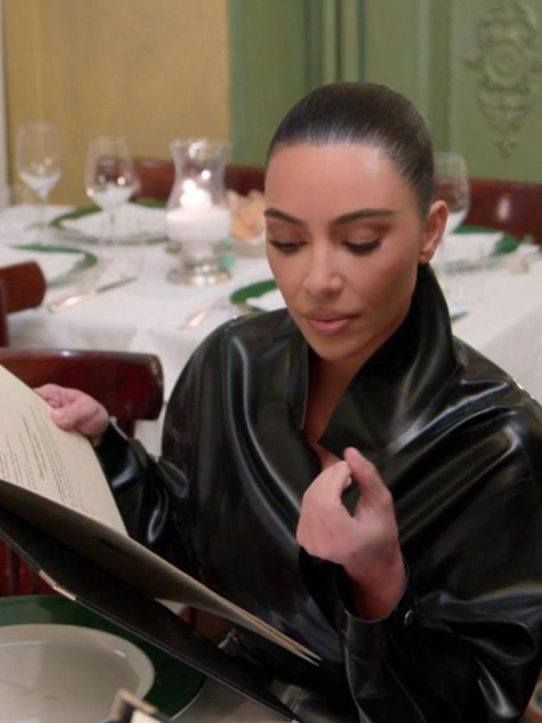 Kim asked the waiter to describe tortellini while dining in Milan.