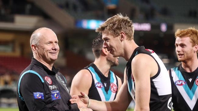 Hinkley with forward Todd Marshall. Picture: Sarah Reed/AFL Photos via Getty Images