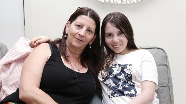 Tori, 14, and her mother Tina at home. Picture: Tertius Pickard.