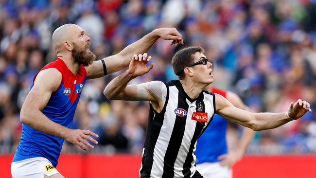 Max Gawn of the Demons and Mason Cox of the Magpies.