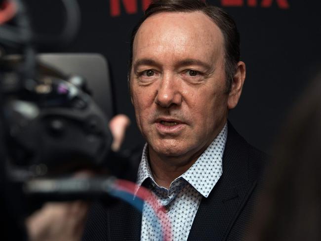 (FILES): This file photo taken on February 23, 2016 shows actor Kevin Spacey arriving for  the season 4 premiere screening of the Netflix show "House of Cards" in Washington, DC.  Production of next season's award-winning "House of Cards" season six has been suspended indefinitely in the wake of sexual misconduct allegations against its star Kevin Spacey, Netflix announced on October 31, 2017. Media Rights Capital and Netflix said the suspension was "until further notice, to give us time to review the current situation and to address any concerns of our cast and crew."   / AFP PHOTO / Nicholas Kamm