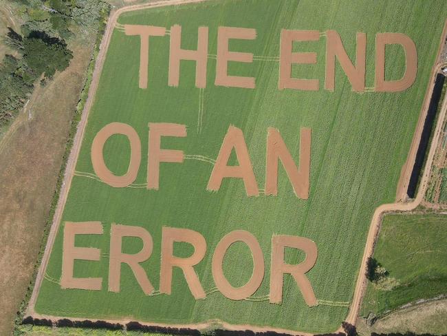 The farmer’s bold statement lies under the flight path.