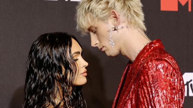 FILE - JANUARY 12: Actress Megan Fox and musician Machine Gun Kelly are engaged. NEW YORK, NEW YORK - SEPTEMBER 12: (L-R) Megan Fox and Machine Gun Kelly attend the 2021 MTV Video Music Awards at Barclays Center on September 12, 2021 in the Brooklyn borough of New York City. (Photo by Jamie McCarthy/Getty Images for MTV/ ViacomCBS)