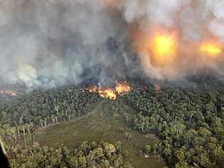 PREPARE FOR THE WORST: Emergency services captured this aerial view of a fire burning near Wallangarra during an earlier bushfire season. Picture: QFES