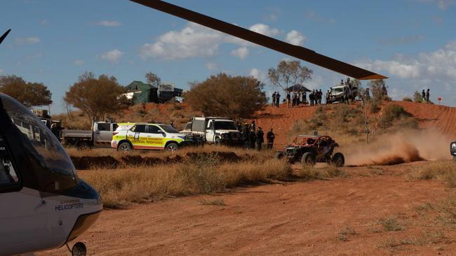 Emergency services at the scene of the crash at Finke Desert Race where one person died and two others were injured. Picture: Supplied