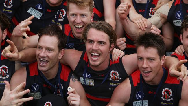 Old Xaverians players are all smiles after the club’s 2016 premiership. Picture: Stuart Milligan