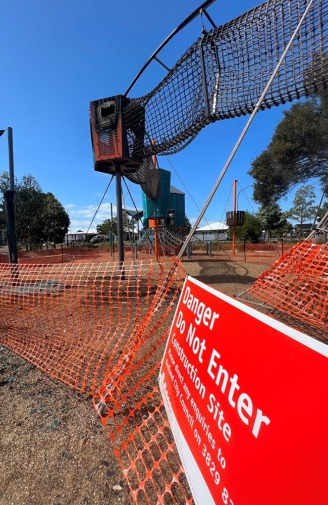 Redland council erected barriers and warning signs after a fire ripped through a children’s playground early Monday, September 11. Pictures: contributed